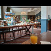 Breakfast comes with a shot of this yellow drink, which is made from orange, lemon, ginger and somet...