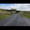 Whatever is buried under this strip of new tarmac obviously couldn't go through the cattle grid.