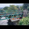 People working on a railway bridge.