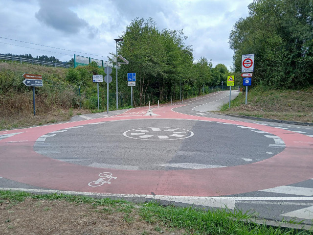 Here, one of those pedestrian and cycle paths ends at a roundabout junction with a normal road.