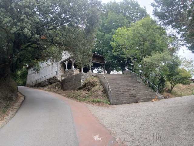 The road has come out of the top of the town and is continuing to climb. This is the San Roke Chapel...
