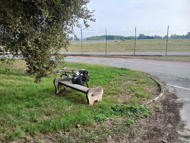 There is a one-way cycling circuit around the perimeter of the airport. It seems quite popular....