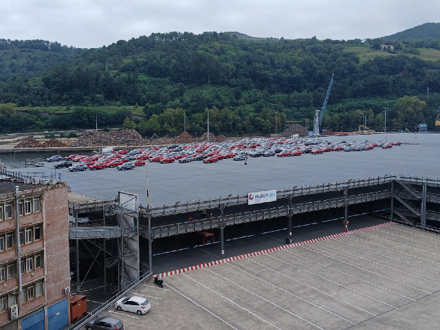 Cars being either imported or exported.