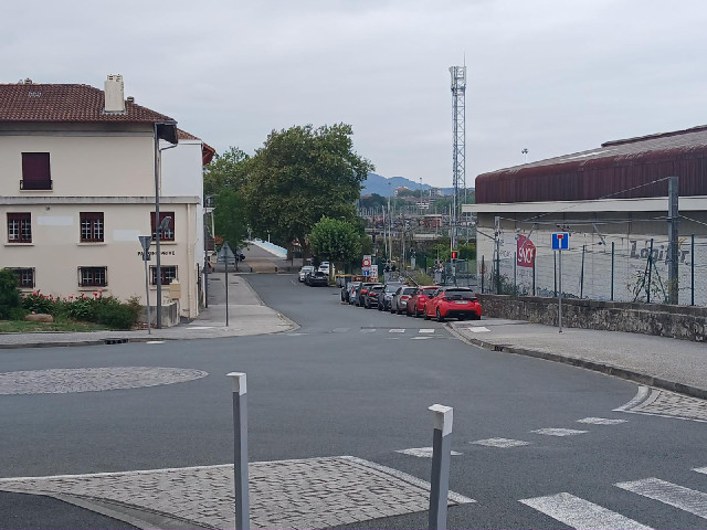 Looking back down the road to the pedestrian border bridge from the French side.