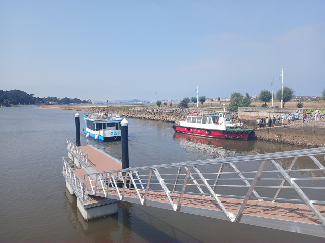 I sat here for about an hour watching ferries from two companies come and go. The red ones seem to b...