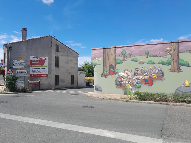 A strange mural in Saint-Ciers-sur-Gironde. Those creatures are eating a human leg.