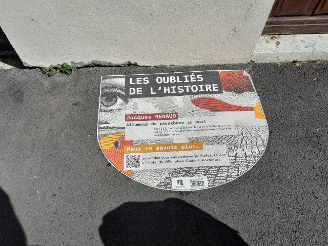 Outside some of the houses there are stickers like this referring to "forgotten people from his...