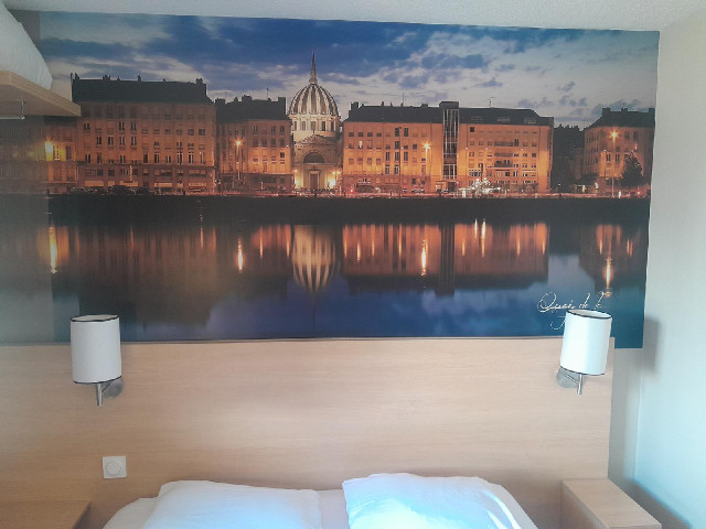 My room has a better picture of the church of Notre-Dame-de-Bon-Port than ...