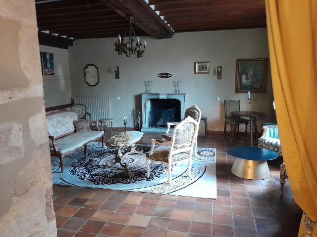 A room downstairs in the hotel. It smells as if the fireplace has been used recently, which seems un...