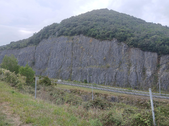 A deep motorway cutting.