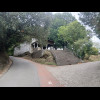 The road has come out of the top of the town and is continuing to climb. This is the San Roke Chapel...