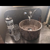 I won't be able to get my water bottles under that tap but at least there is a proper glass to drink...