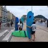 The pedestrian, bike and car lanes weave around and cross each other, each with their own traffic li...