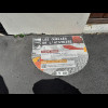 Outside some of the houses there are stickers like this referring to "forgotten people from his...