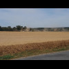 A tractor creating some dust.