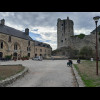 The building on the left, inside the castle, is a restaurant and hotel. I've booked a room there for...