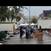 Oh, Monday must be market day in Bricquebec. The cage in the bottom left of the picture has live dov...