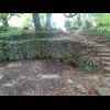 The row of holes at the bottom of that wall are the Seven Springs, which could be considered to be t...