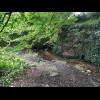 Almost immediately after emerging from the springs, the water disappears into that dark pipe to go u...